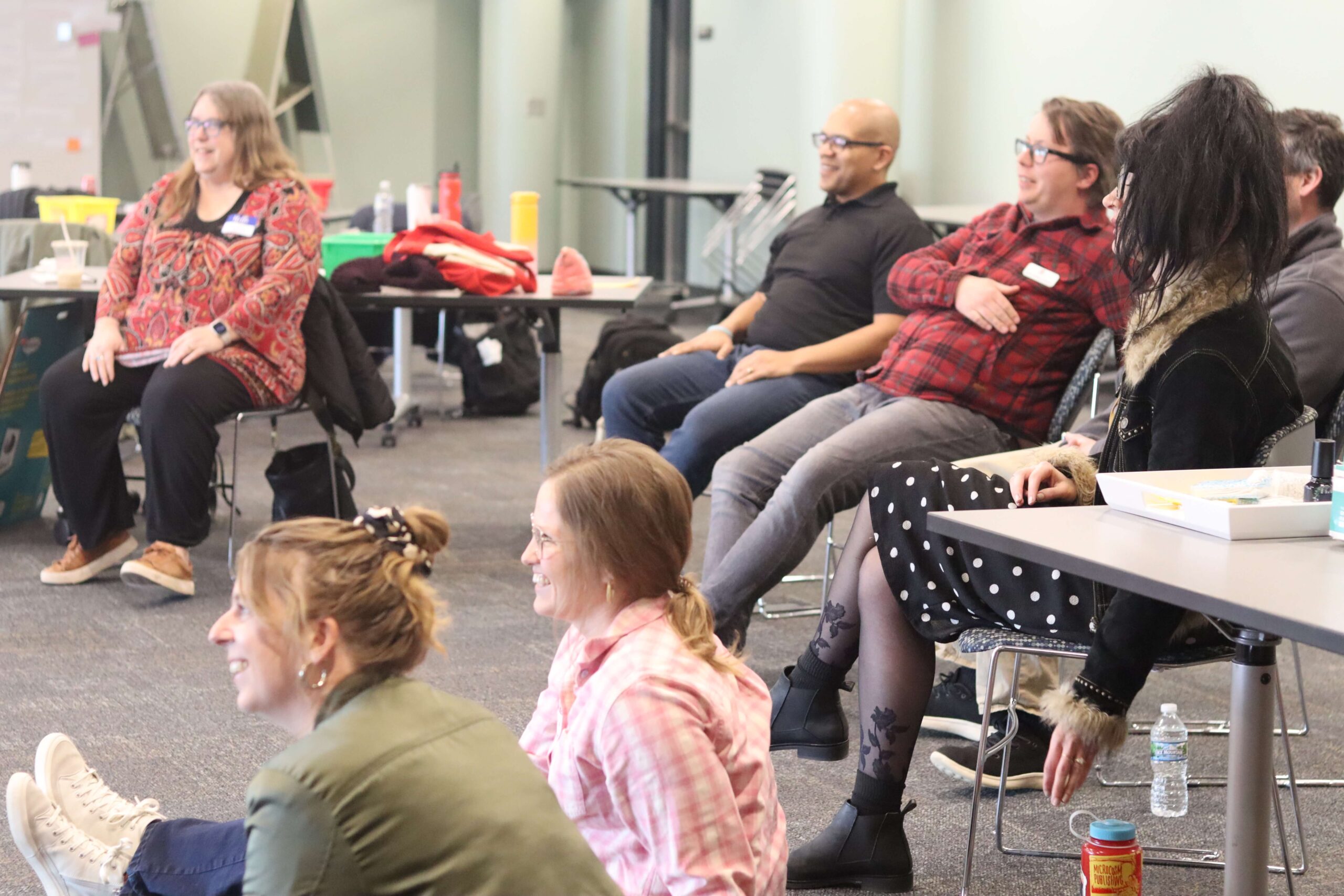 Individuals participating in a group discussion